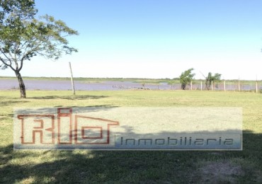 Complejo de cabañas sobre Rio Coronda y Ruta Nacional N° 11